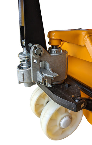 Yellow pallet jack wheels and pump